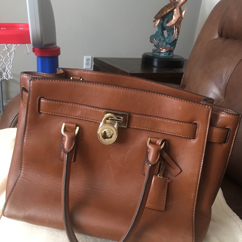 Authentic mk purse with sling handle